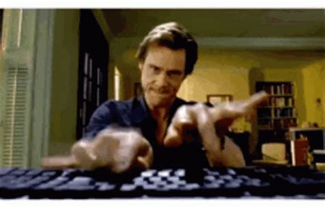 jim carrey typing gif